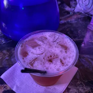 a drink in a plastic cup