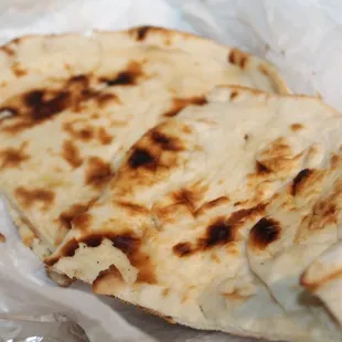 Butter naan delivered by Caviar