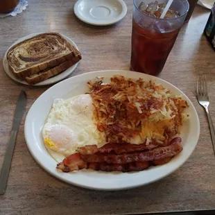 Solar Restaurant in Richmond, IL. Eggs over easy with bacon, hashbrowns, and rye toast.