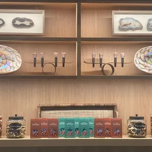 Shelves displaying Dilettante Chocolates at the new Plaza Center Mocha Café location