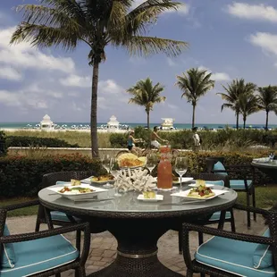 DiLido Beach Club outdoor seating over looking the Atlantic Ocean.