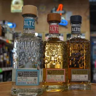 three bottles of liquor