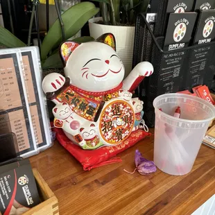 Maneki Neko, Good Luck Cat Welcoming Dillion&apos;s Dumpling House Customers.