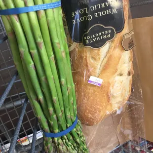 a bag of bread and asparagus