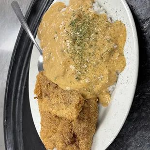 3pc fried Flounder filet Special with steam rice topped with shrimp etouffee sauce.