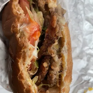 Veggie burger with cheese, lettuce, tomato, ketchup, and Mayo.