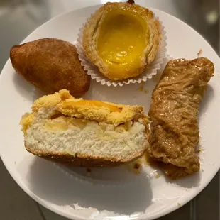 Top: egg custard tart (so buttery &amp; flaky), steamed tofu wrap, 1/2 pineapple bao, fried pork dumpling