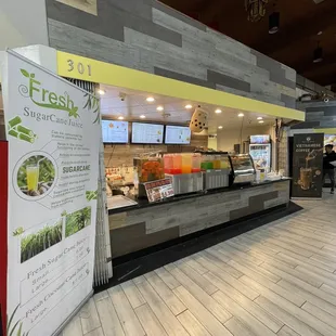 a restaurant counter with a menu on it