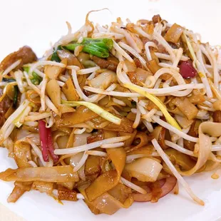 a plate of stir fried noodles