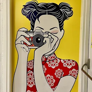 Artwork in restroom hallway