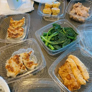 a variety of food in plastic containers