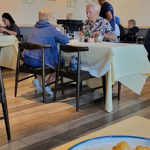 Tacky having a guy with a cart full of bus tubs pushing around displaying all the dirty dishes lol