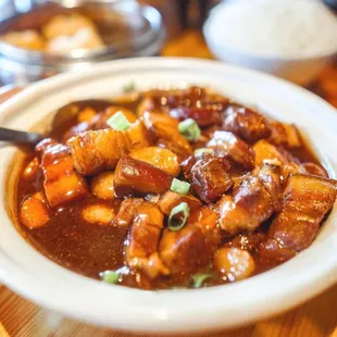 a bowl of chili and meat