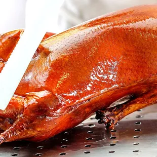 a roasting turkey being prepared