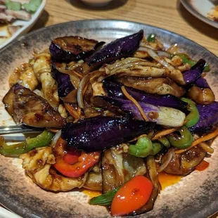 a plate of stir fried vegetables