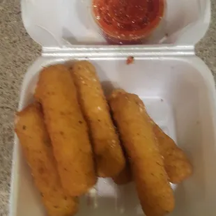 Mozzarella sticks with marinara sauce