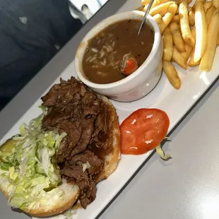 Roast beef po boy with gumbo and fries