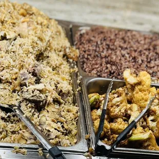 Chicken and rice, black beans and rice, and fried cauliflower