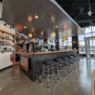 Bar seating - looked more comfy than where we sat. Note the purse hooks under the bar.