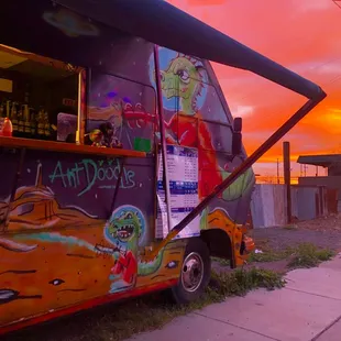 a food truck parked on the side of the road