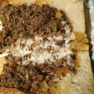 ?? Supposedly this is a large steak &amp; cheese sub..It had  the waste,  nastiness after-taste @ $16.00