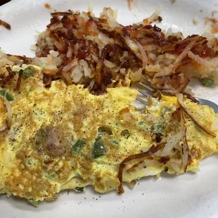 Western omelette w sausage instead of ham; my hash browns with ketchup