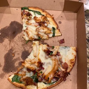 Chicken, bacon, spinach and white sauce on a gluten free cauliflower crust.