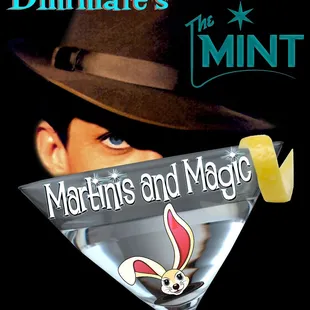 a man wearing a hat and holding a martini