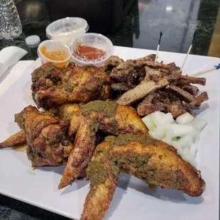 Chicken wings and suya (beef)