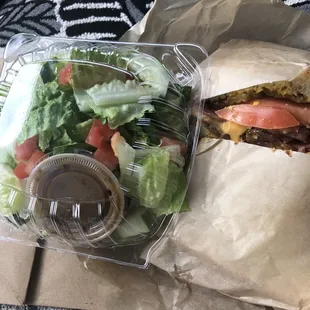 Hot pastrami sandwich (10.50) with side salad.