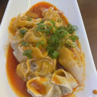 H8. Pork and Veg. Wontons in Spicy Peanut Sauce