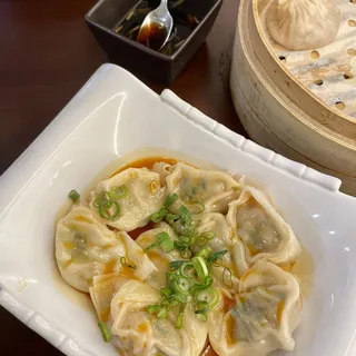 B16. Pork and Vegetable Wontons in Spicy Peanut