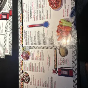 a menu and a plate of food