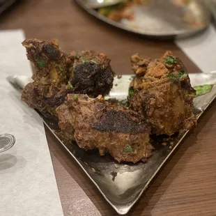 a plate of fried meat