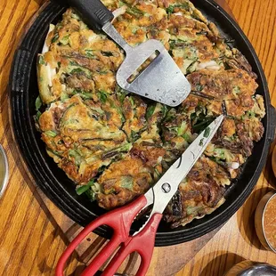 Seafood green onion pancake. Very delicious.