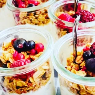 yogurt cups with berries and granola