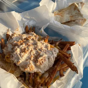 Crabby fries ($12) and loaded crab quesadilla ($12)