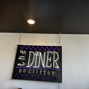 a neon sign for a restaurant