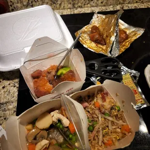 a variety of food in take out containers