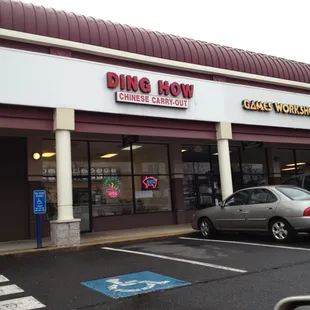 a car parked in front of a store
