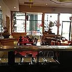 a view of the dining room from the bar