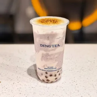 Taro mix burnt cream green milk tea.