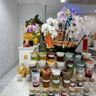 a display of various teas and condiments