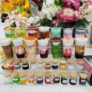 A colorful display of drink options and toppings
