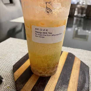 My curdled mango milk tea. This was 30 mins after we got the order.