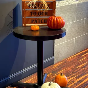 a table with pumpkins on it