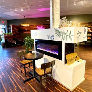 a fireplace in the middle of a room