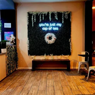 a coffee shop with a sign that says, i'm just you, and donuts