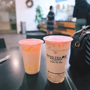 Rose milk tea (regular) + Signature milk tea (large)