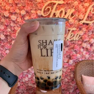 Signature Milk Tea with boba, large size (700 mL).